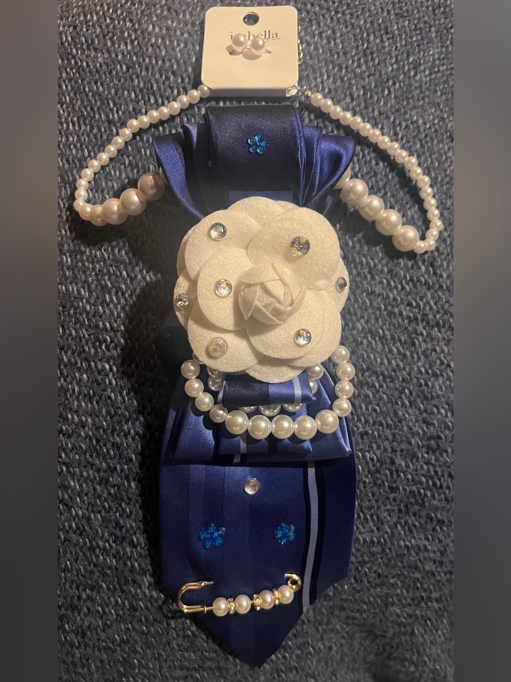 Elegant Blue and Cream Floral Necktie with beautiful accents.